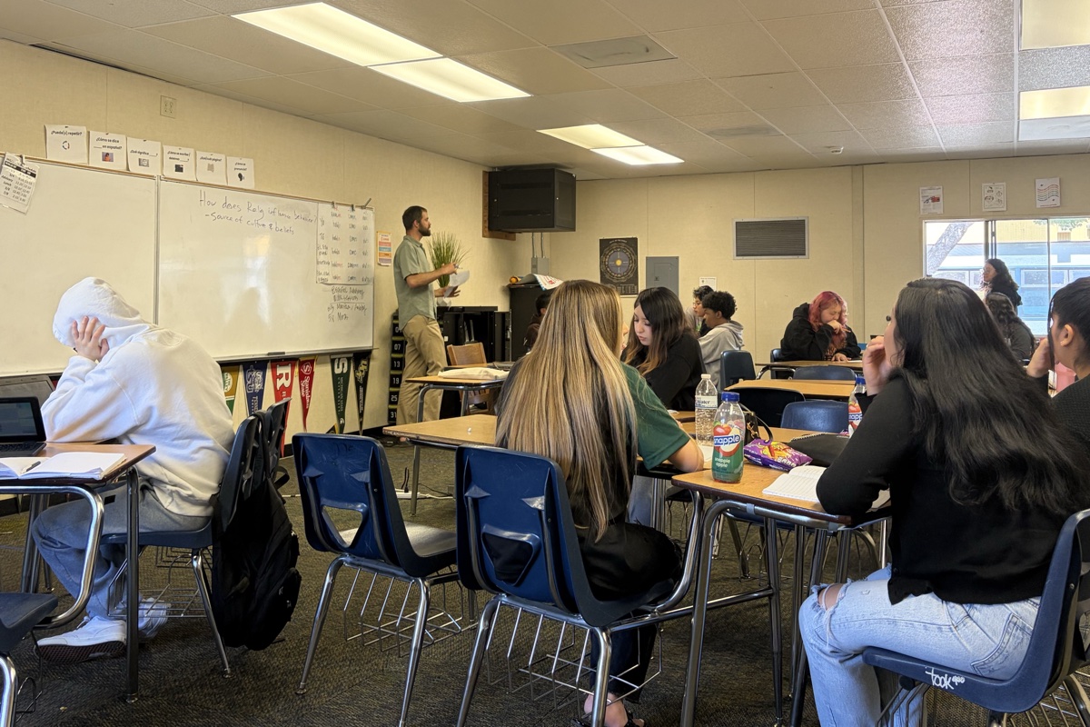 OakTown Leaders students participating in a classroom lesson with their instructor